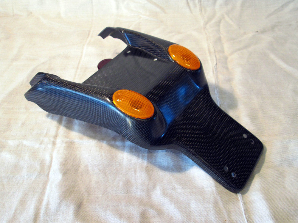 Nummerplåtshållare med blinkers Carbon, Monster 93-99